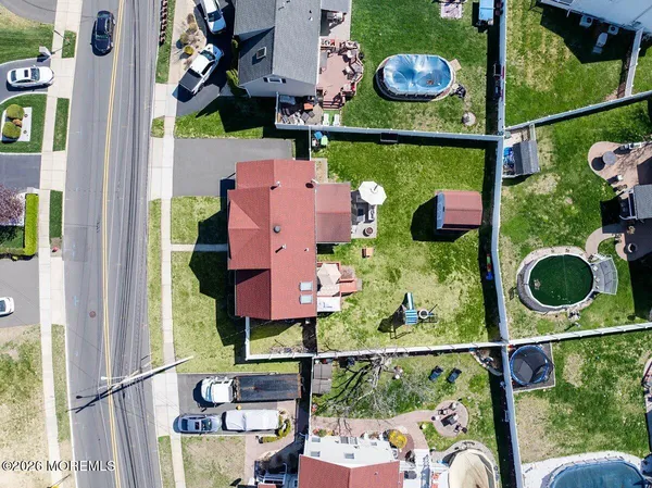 an aerial view of houses and roads