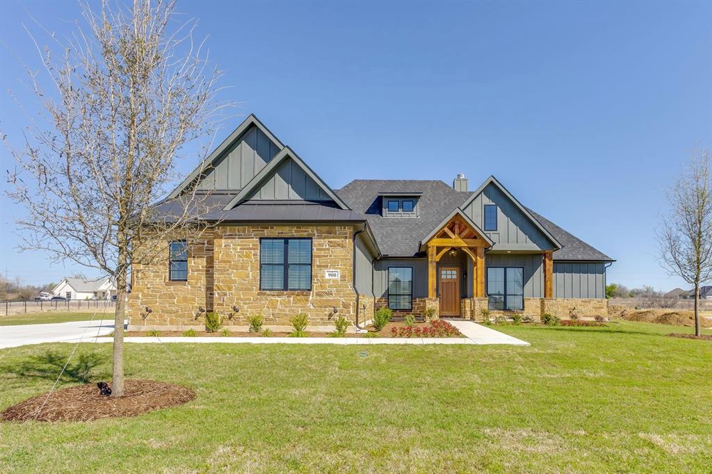 900 Medaris Way Azle, TX 76020 - Photo 1 of 1 a front view of a house with a yard
