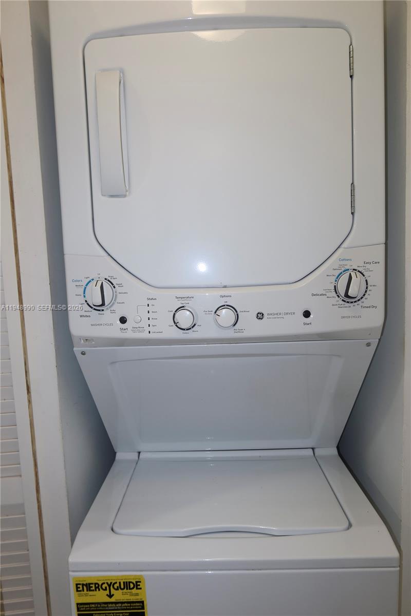 2351 Douglas Road, Unit 601 Miami, FL 33145 - Photo 14 of 36 a view of washer and dryer