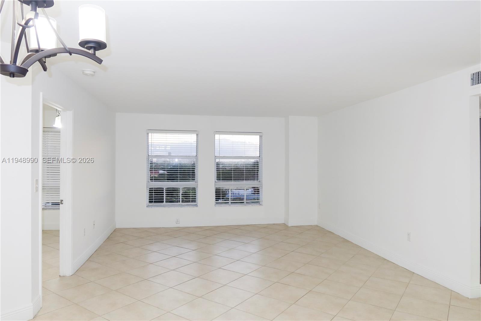 2351 Douglas Road, Unit 601 Miami, FL 33145 - Photo 16 of 36 an empty room with windows