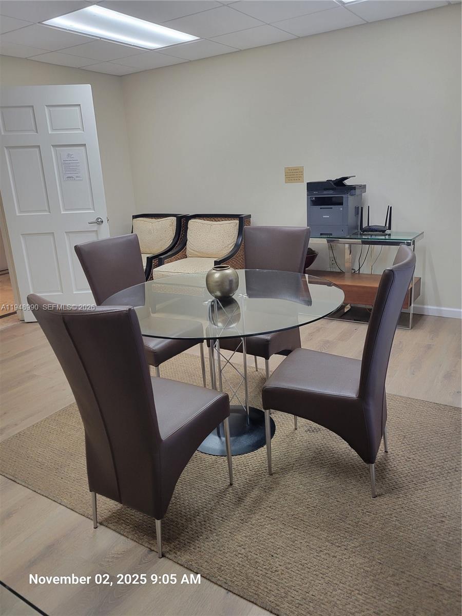 2351 Douglas Road, Unit 601 Miami, FL 33145 - Photo 22 of 36 a view of a dining room with furniture