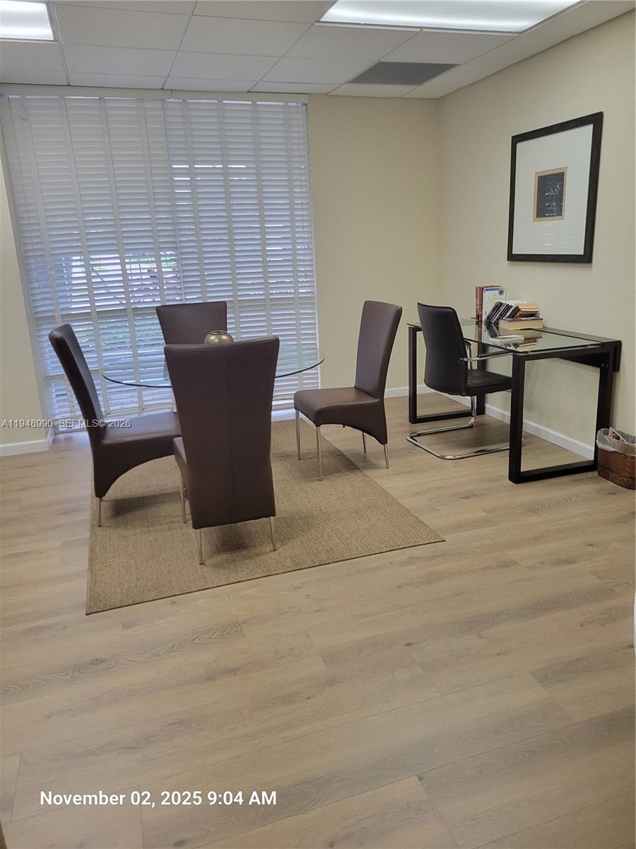 2351 Douglas Road, Unit 601 Miami, FL 33145 - Photo 26 of 36 a view of a dining room with furniture