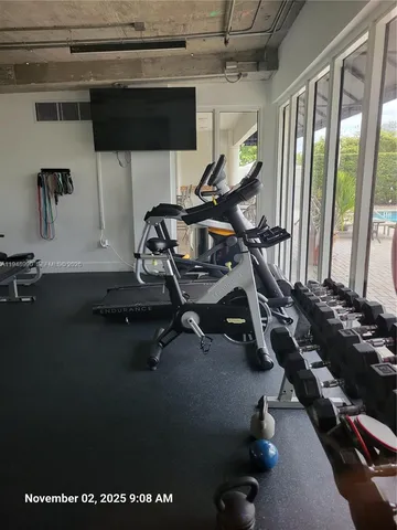 a view of a room with gym equipment