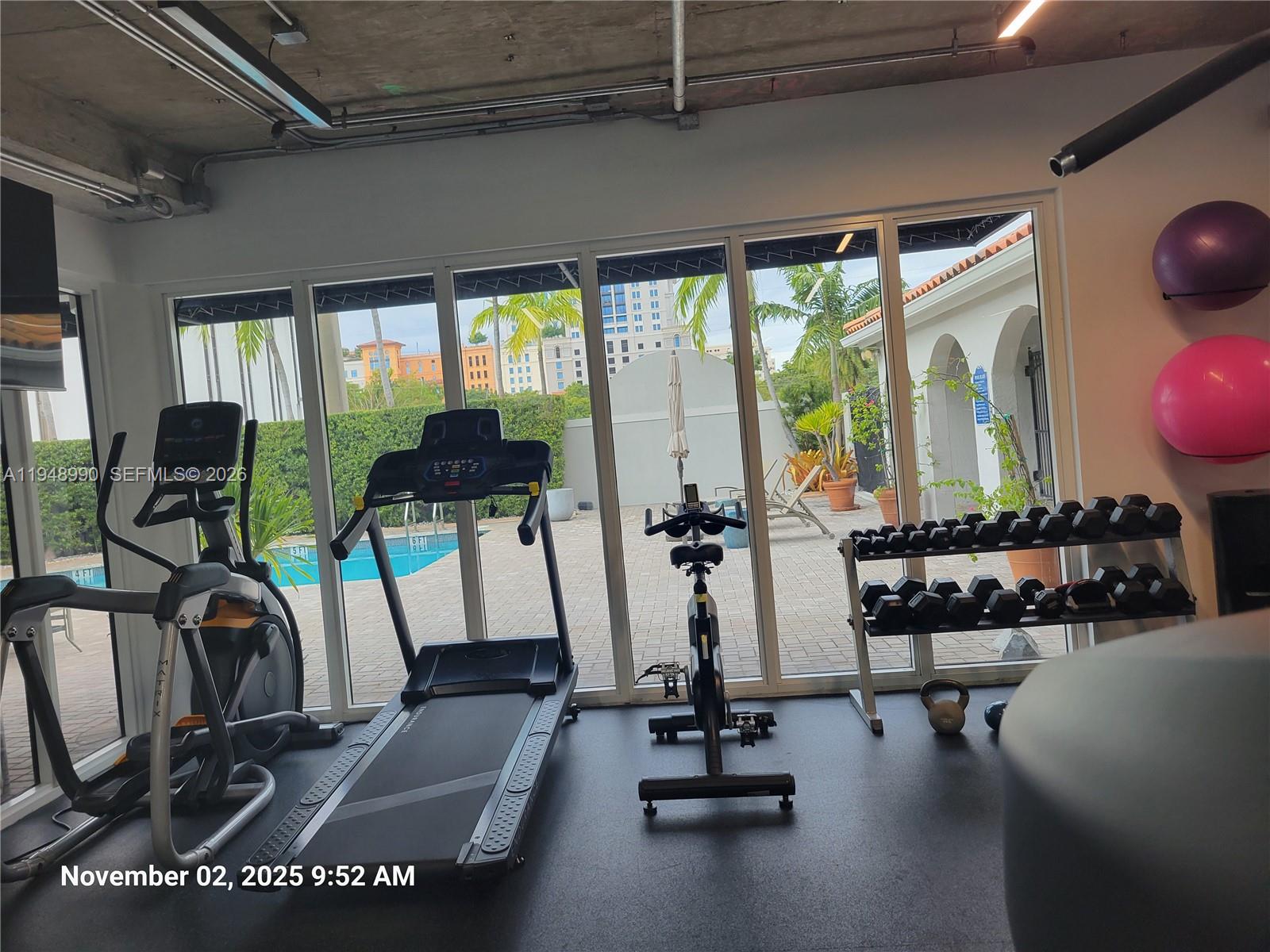 2351 Douglas Road, Unit 601 Miami, FL 33145 - Photo 35 of 36 a view of a room with gym equipment