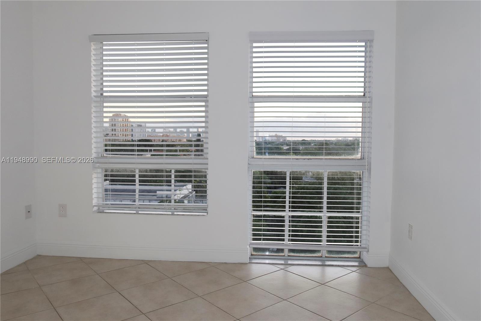 2351 Douglas Road, Unit 601 Miami, FL 33145 - Photo 7 of 36 a view of a room that has a window in it