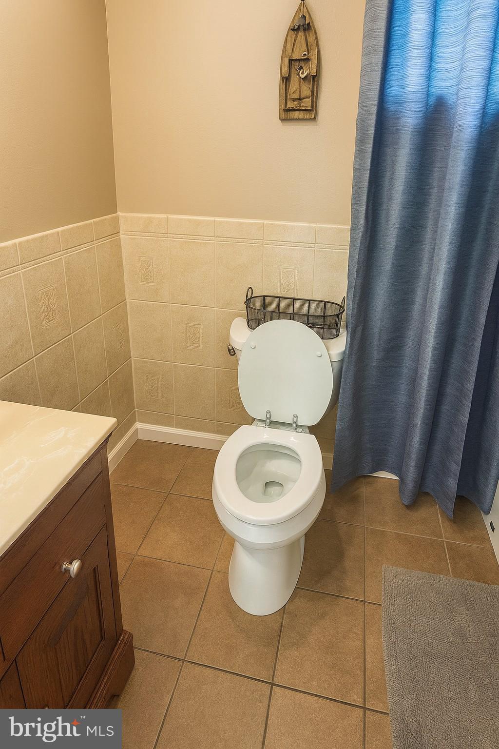 1747 Brookview Road Baltimore, MD 21222 - Photo 11 of 13 a bathroom with a toilet and a sink