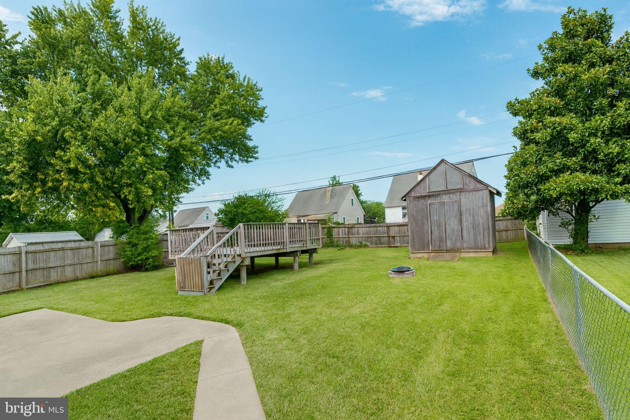 1747 Brookview Road Baltimore, MD 21222 - Photo 13 of 13 a view of house with backyard and a slide
