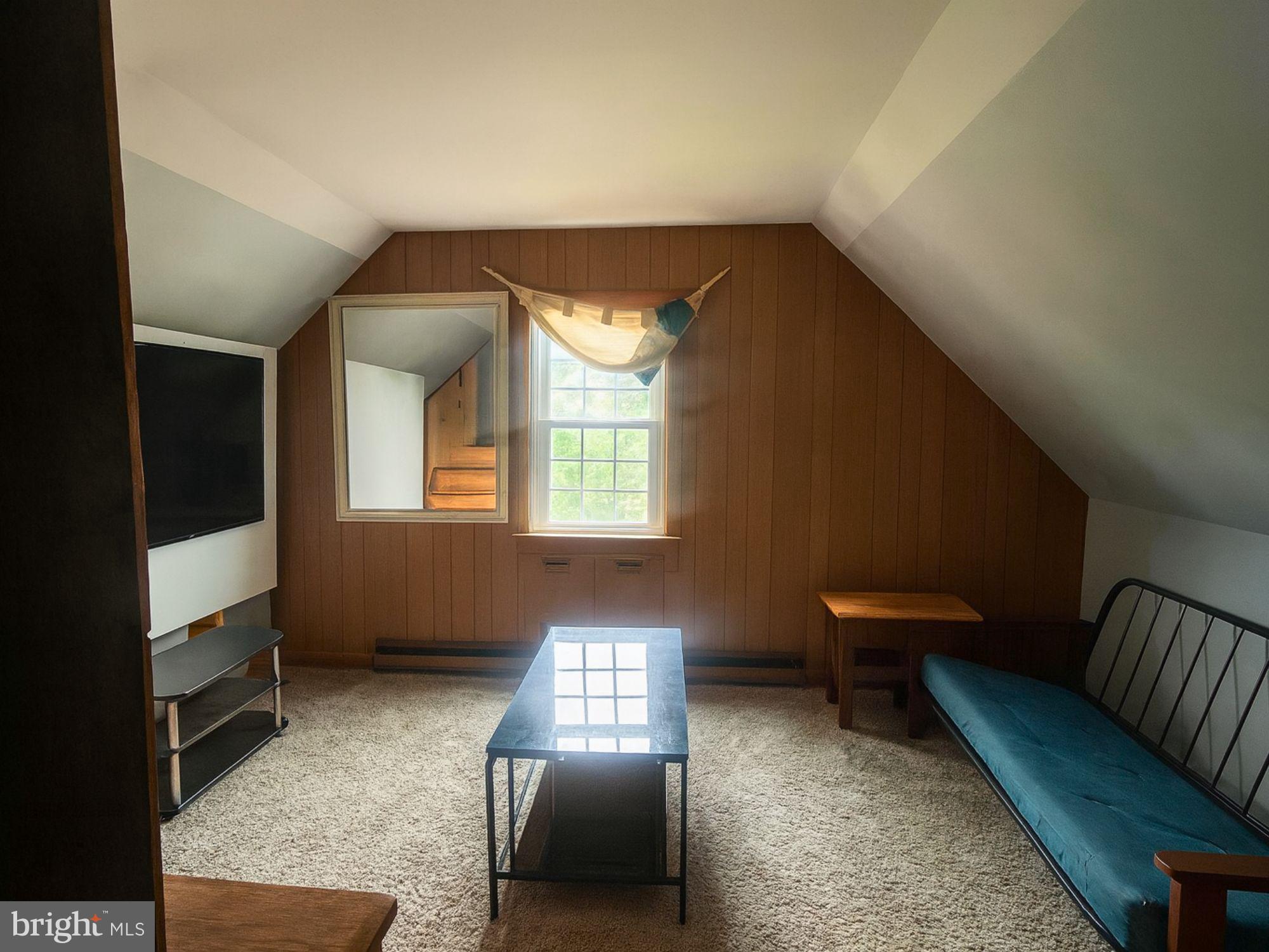 1747 Brookview Road Baltimore, MD 21222 - Photo 6 of 13 a living room with furniture and a window