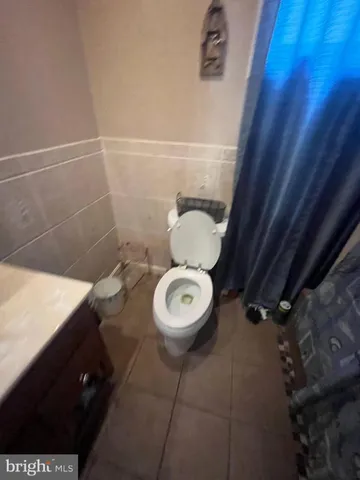 a kitchen with a stove and a microwave