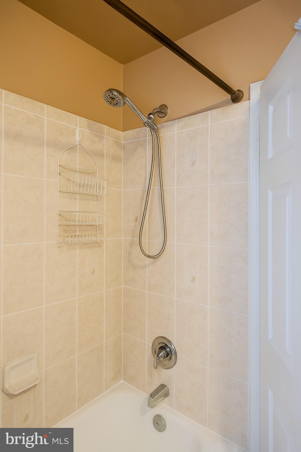 1747 Brookview Road Baltimore, MD 21222 - Photo 10 of 13 a bathroom with a shower and a shower