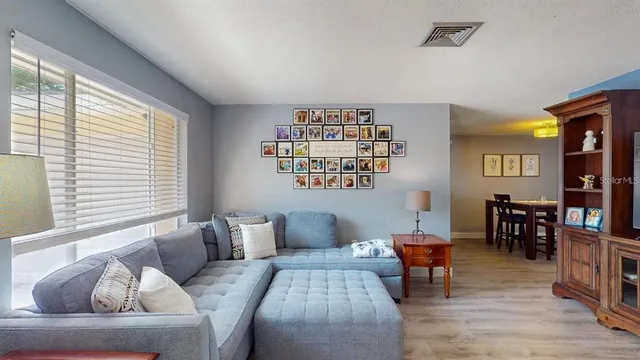 a kitchen with a table and chairs in it