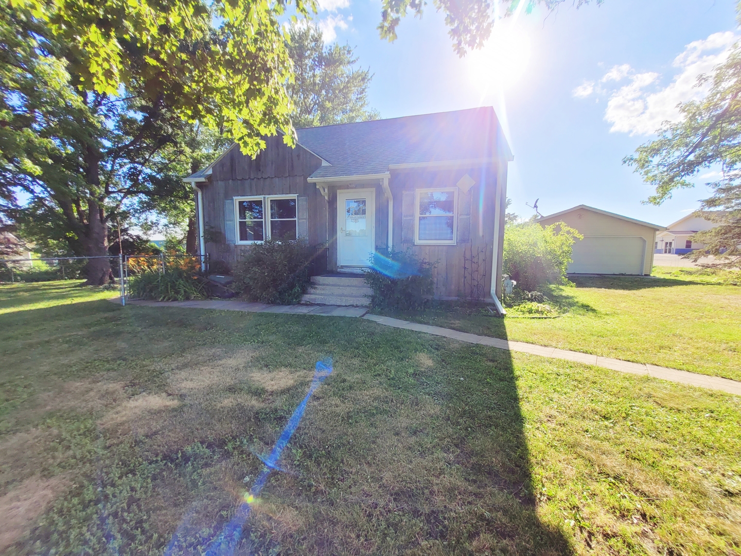 11393 Ward Road Morrison, IL 61270 - Photo 4 of 22 a front view of house with yard and trees around