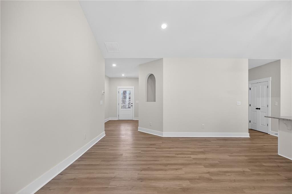 57 Oak Grove Road Taylorsville, GA 30178 - Photo 14 of 42 a view of a big room with wooden floor and windows