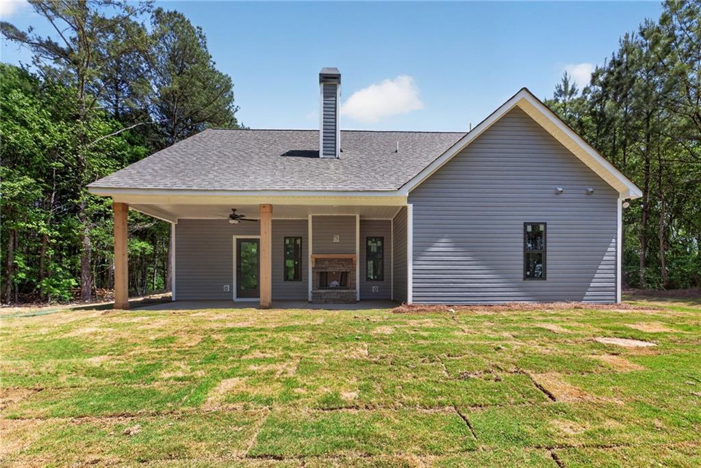 57 Oak Grove Road Taylorsville, GA 30178 - Photo 35 of 42 a view of a house with a yard