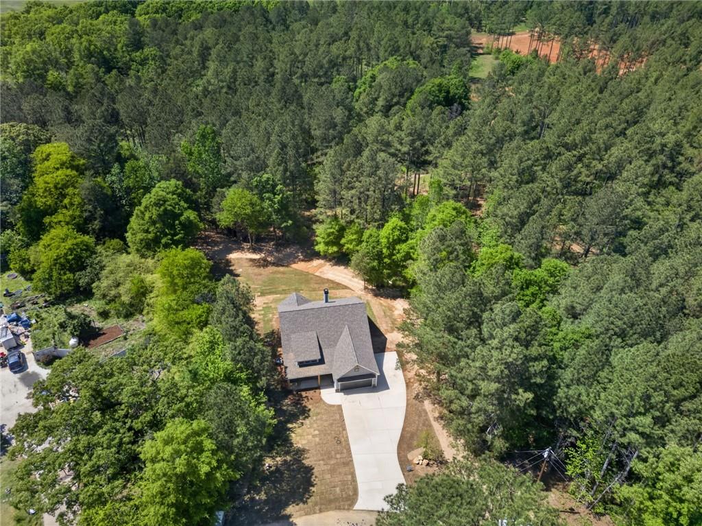 57 Oak Grove Road Taylorsville, GA 30178 - Photo 38 of 42 an aerial view of a house with outdoor space and trees all around