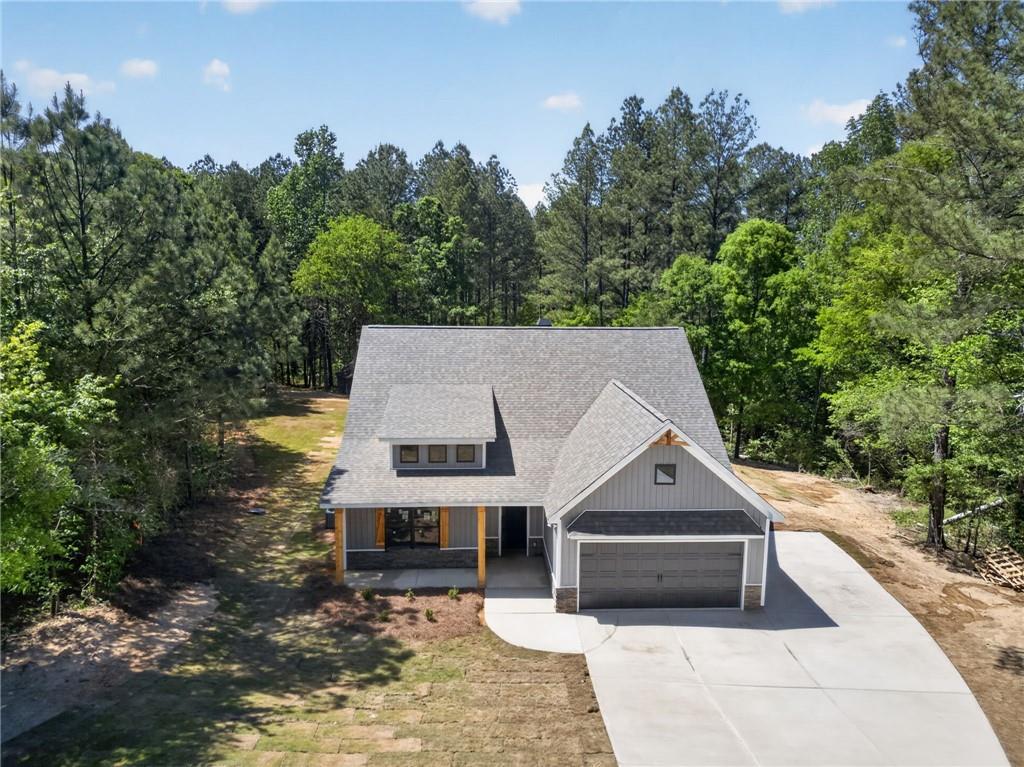 57 Oak Grove Road Taylorsville, GA 30178 - Photo 4 of 42 a view of a house with a yard