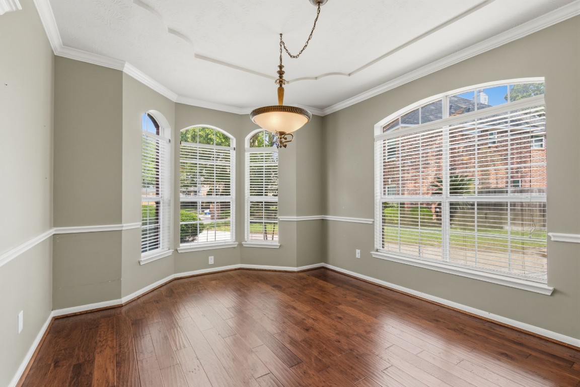 3403 Marywood Drive Spring, TX 77388 - Photo 12 of 50 a view of livingroom with furniture window and wooden floor