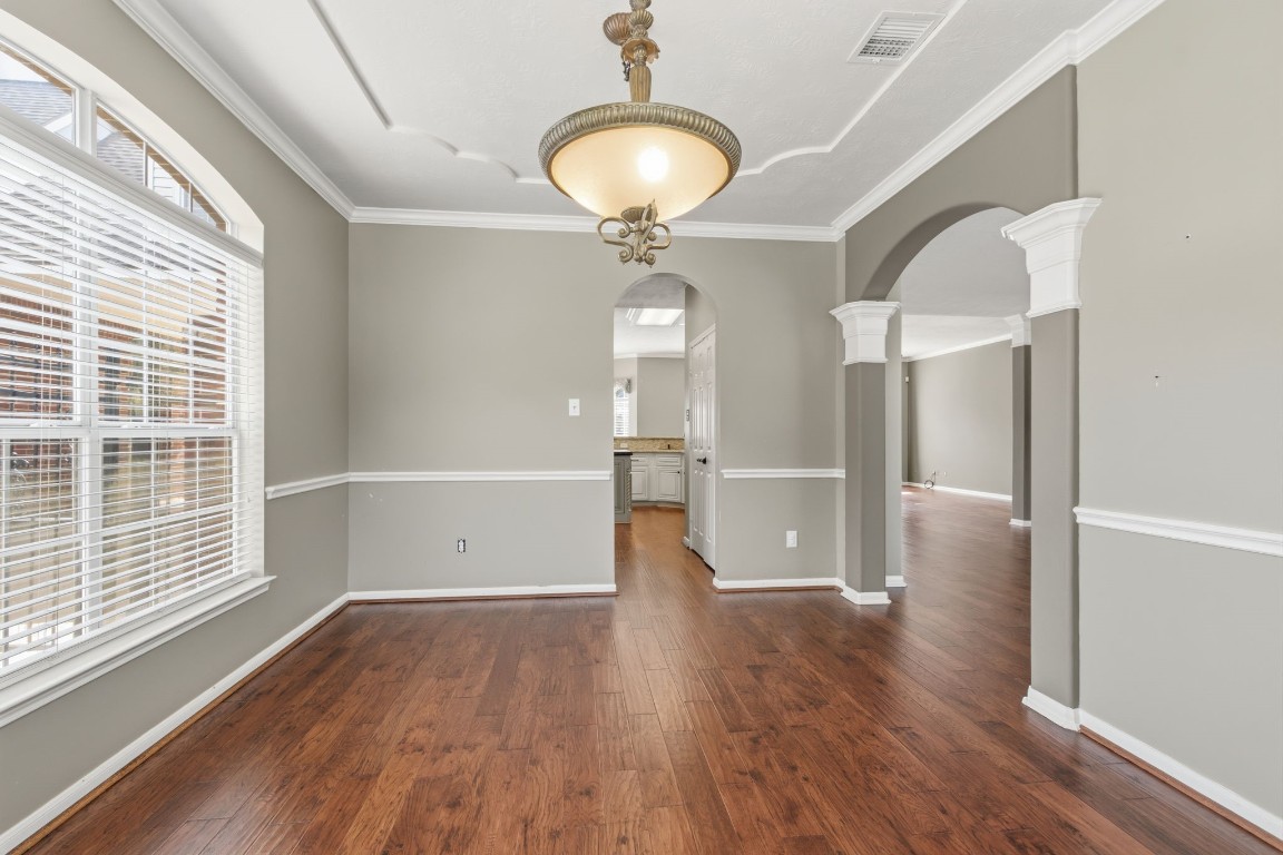 3403 Marywood Drive Spring, TX 77388 - Photo 13 of 50 a view of empty room with wooden floor and fan