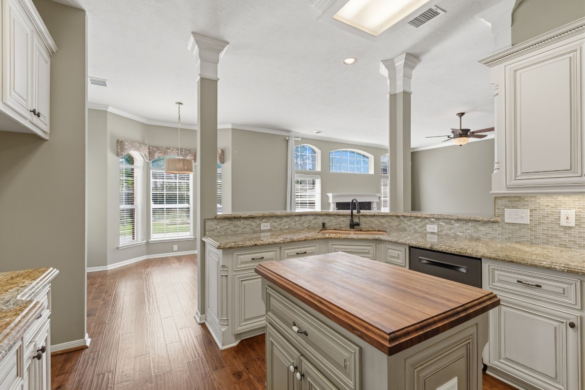 3403 Marywood Drive Spring, TX 77388 - Photo 20 of 50 a kitchen with a stove a sink and a refrigerator