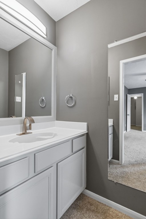 3403 Marywood Drive Spring, TX 77388 - Photo 30 of 50 a bathroom with a sink and a mirror