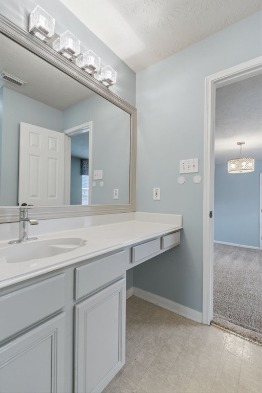 3403 Marywood Drive Spring, TX 77388 - Photo 34 of 50 a bathroom with a double vanity sink and a mirror