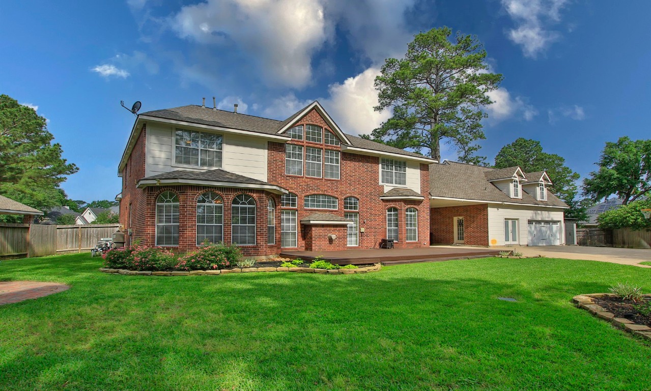 3403 Marywood Drive Spring, TX 77388 - Photo 45 of 50 a front view of a house with a yard and trees