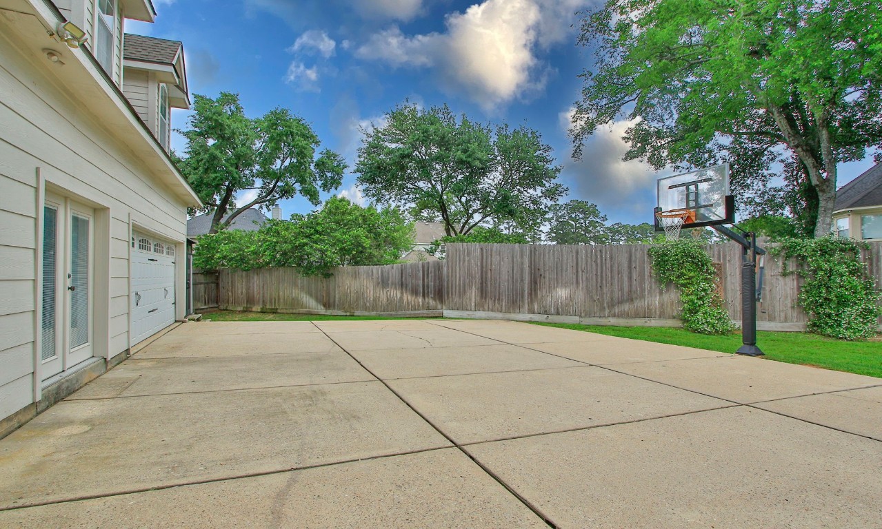 3403 Marywood Drive Spring, TX 77388 - Photo 47 of 50 a view of backyard of house with green space