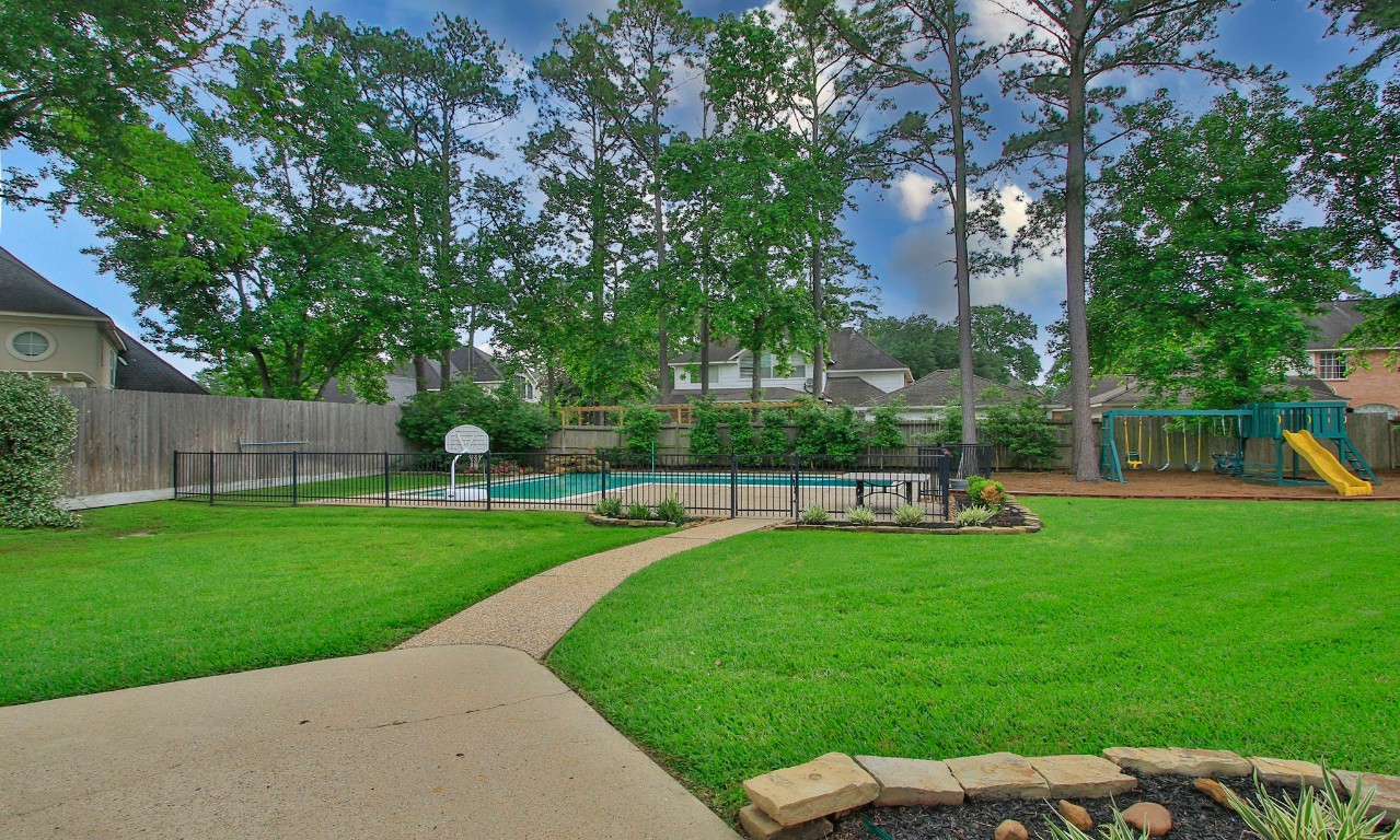 3403 Marywood Drive Spring, TX 77388 - Photo 48 of 50 a view of a backyard with a garden