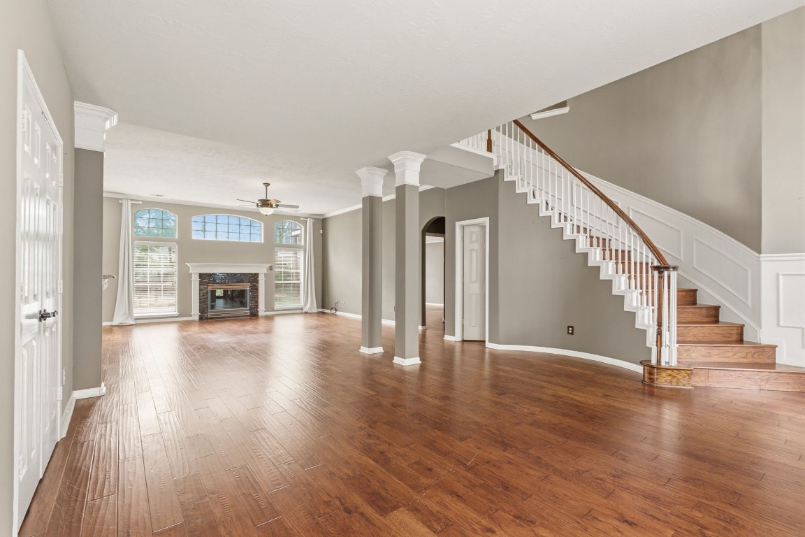 3403 Marywood Drive Spring, TX 77388 - Photo 7 of 50 a view of empty room with wooden floor and fireplace
