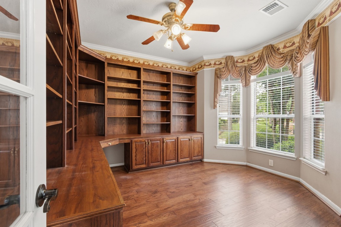 3403 Marywood Drive Spring, TX 77388 - Photo 10 of 50 a view of an empty room with a window and wooden floor