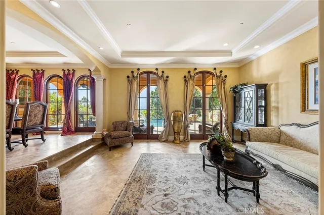 a bathroom with a sink and a mirror with window