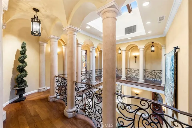 a view of a yard with wooden fence