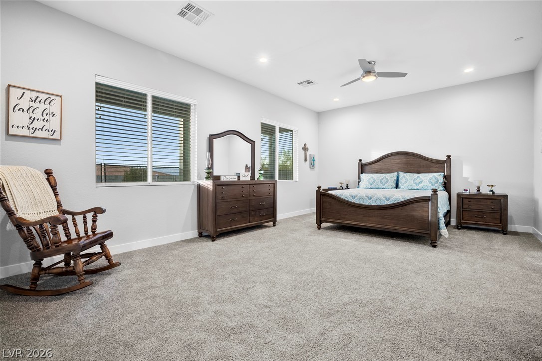 432 North Racetrack Road Henderson, NV 89015 - Photo 13 of 45 Bedroom featuring light colored carpet, ceiling fan, and recessed lighting