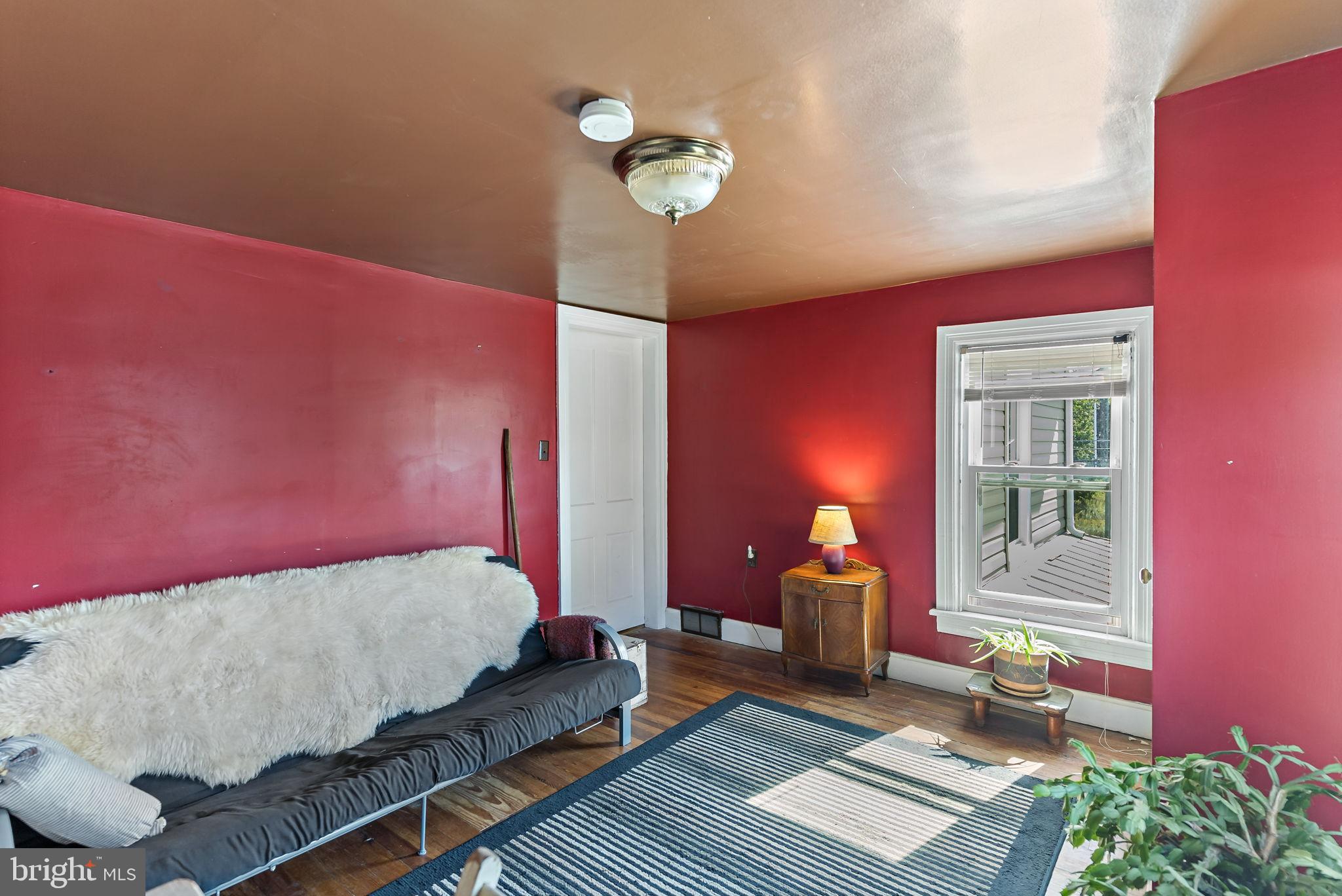 9157 Williamsport Pike Falling Waters, WV 25419 - Photo 12 of 51 a bed room with a bed and a window