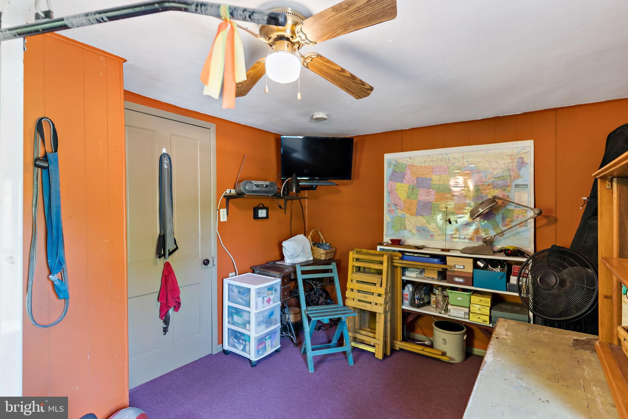 9157 Williamsport Pike Falling Waters, WV 25419 - Photo 14 of 51 a view of a room with gym equipment