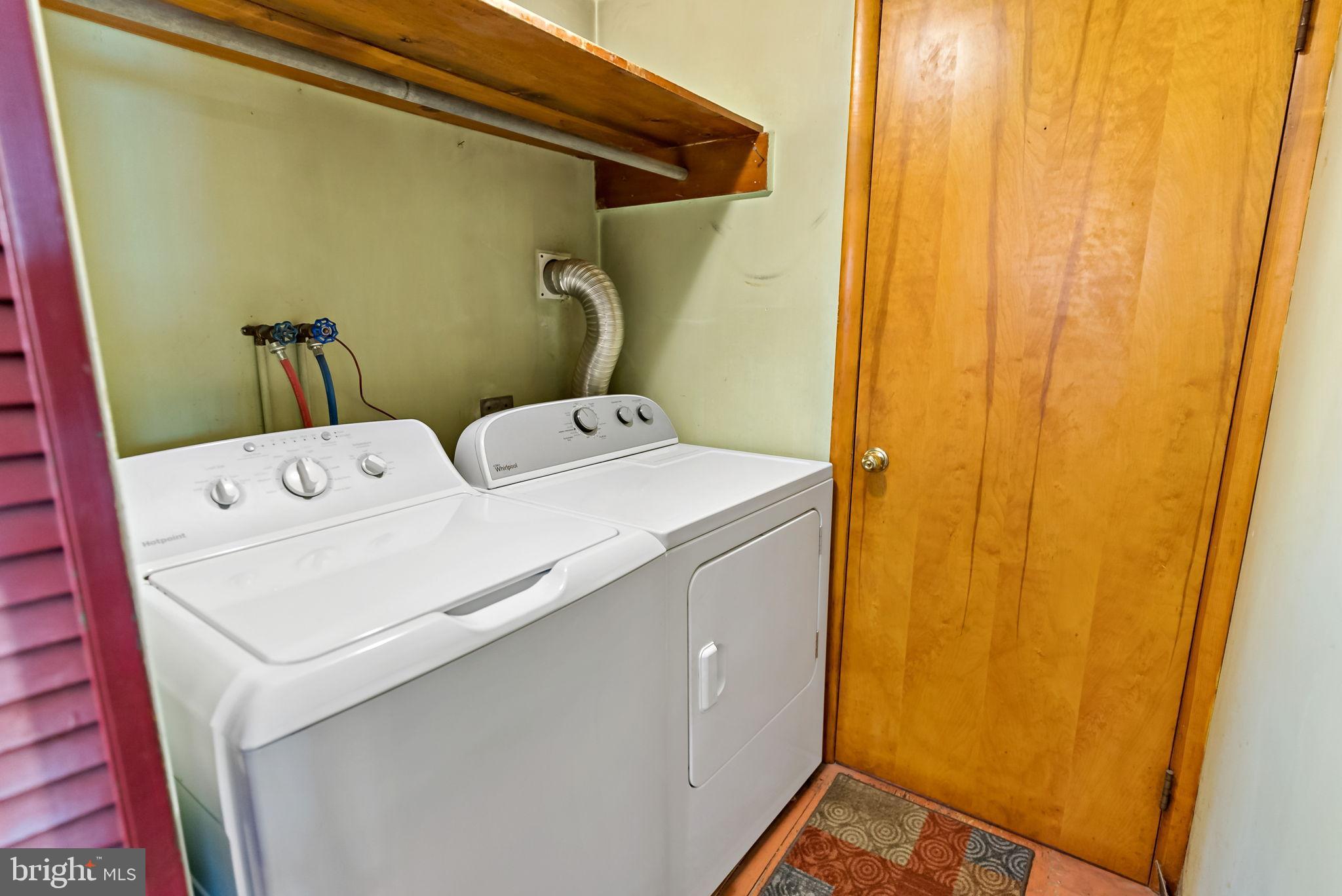 9157 Williamsport Pike Falling Waters, WV 25419 - Photo 23 of 51 a utility room with dryer and washer