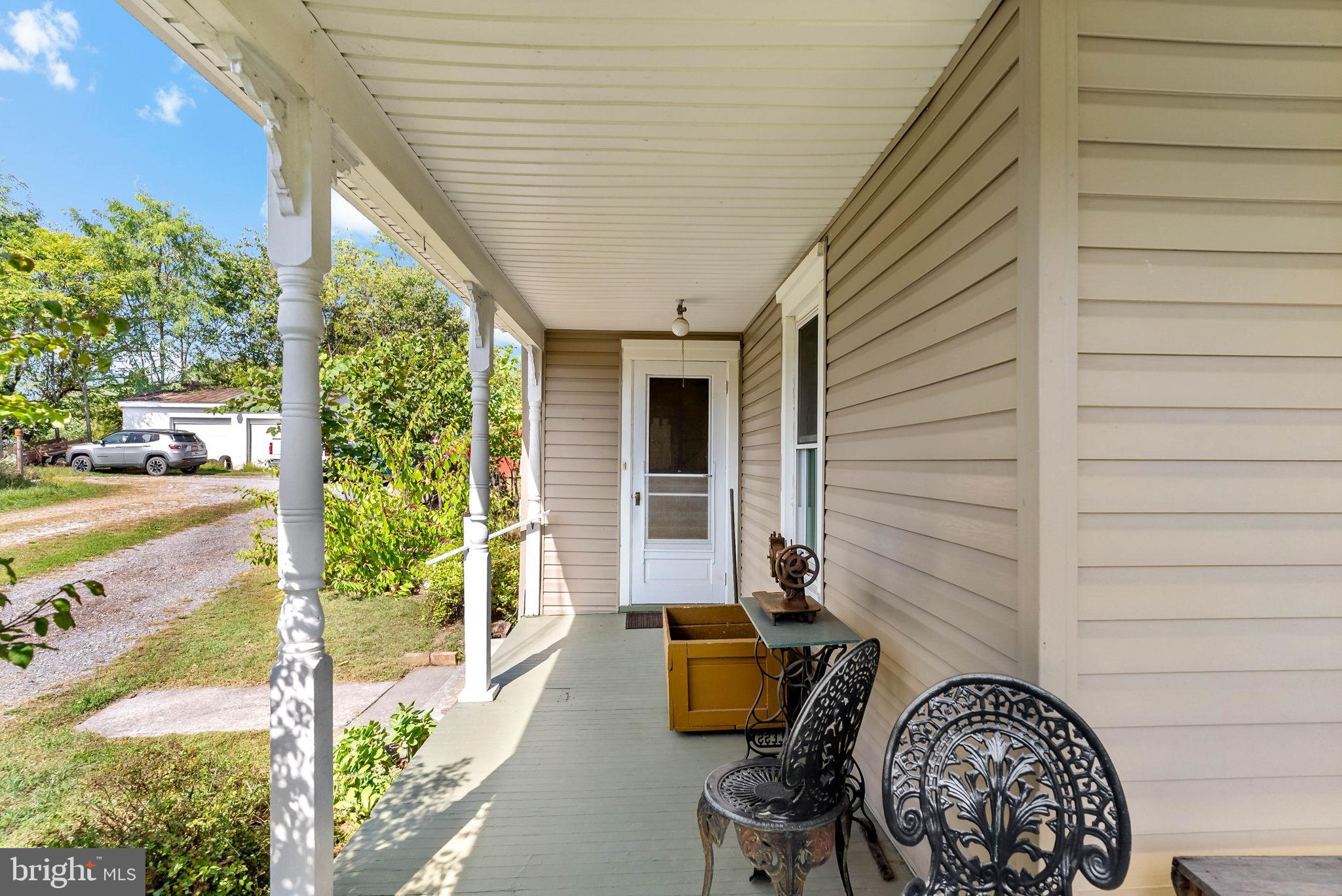 9157 Williamsport Pike Falling Waters, WV 25419 - Photo 3 of 51 a view of entryway with garden
