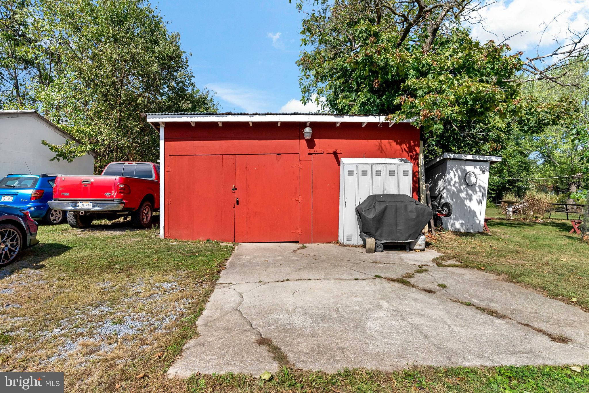 9157 Williamsport Pike Falling Waters, WV 25419 - Photo 33 of 51 a view of a car parked in the yard