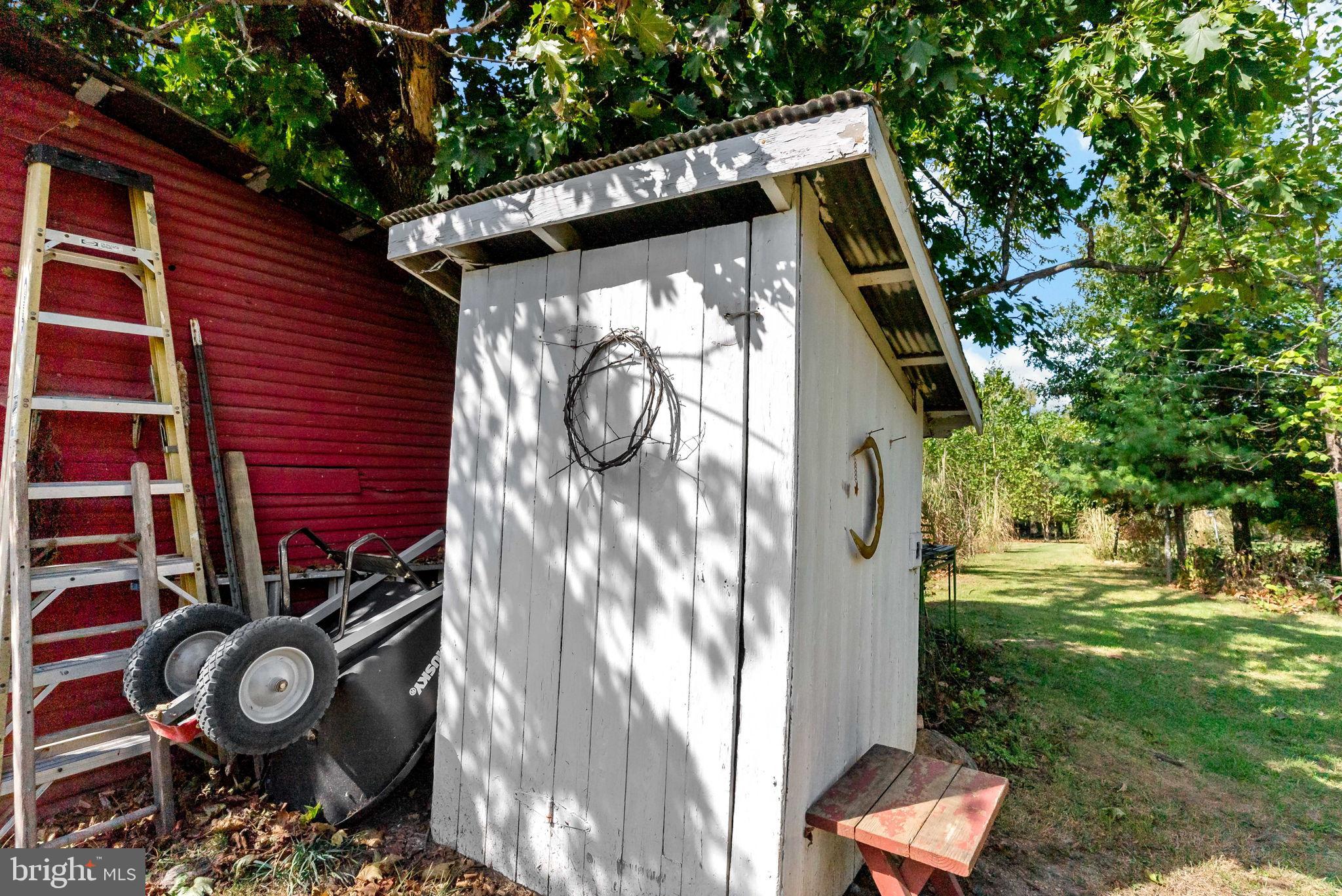 9157 Williamsport Pike Falling Waters, WV 25419 - Photo 37 of 51 a view of a small house with yard