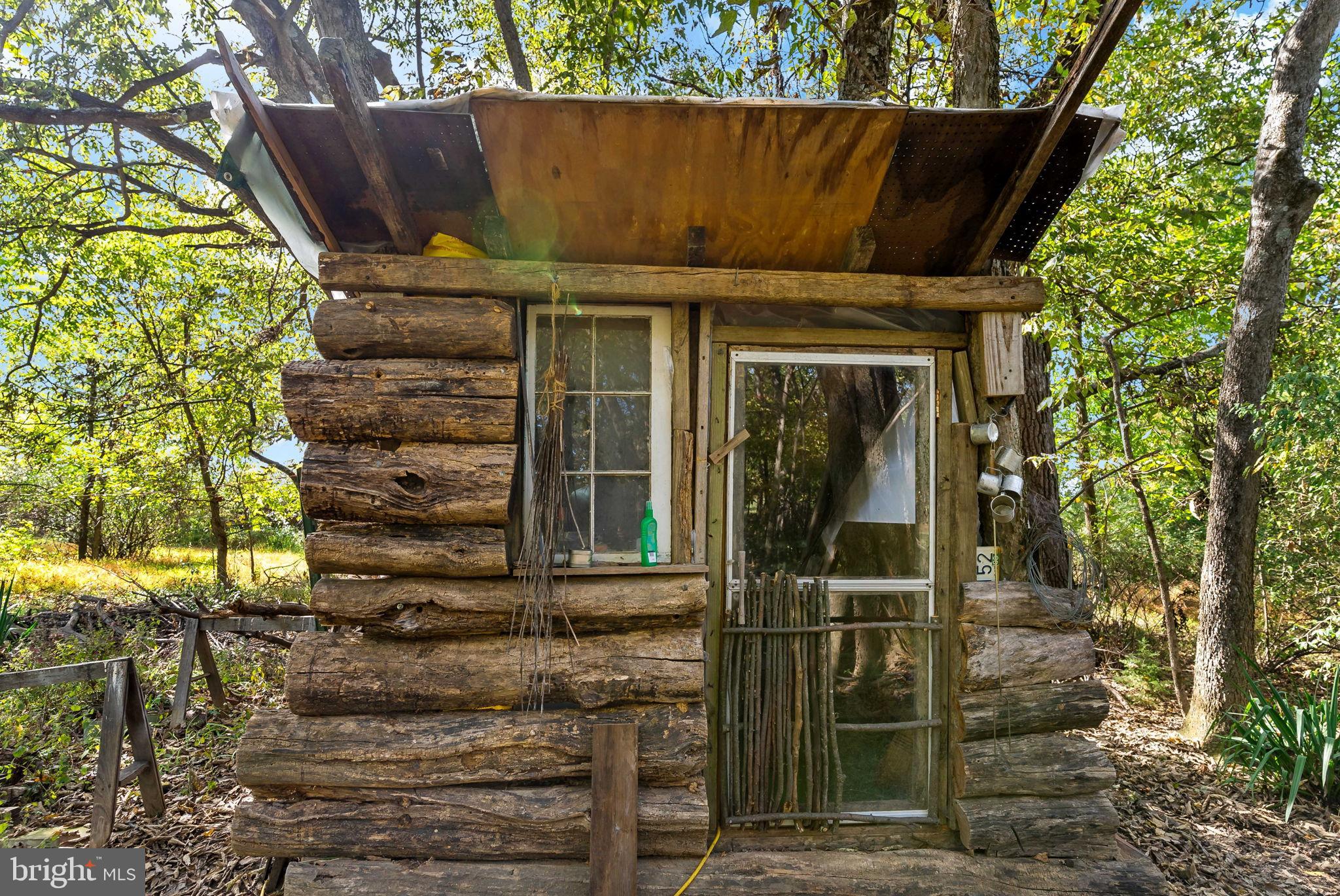 9157 Williamsport Pike Falling Waters, WV 25419 - Photo 45 of 51 front view of a house with a door