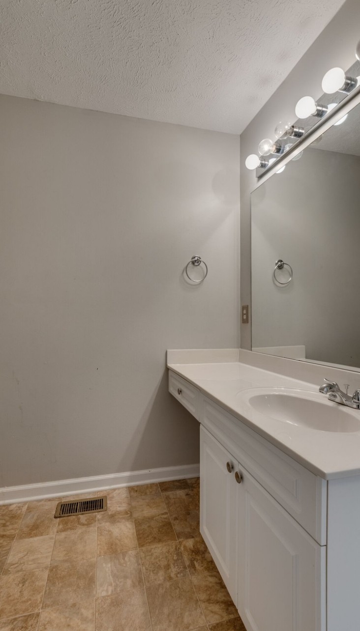 3001 Hamilton Church Road, Unit 403 Antioch, TN 37013 - Photo 11 of 21 a bathroom with a sink and vanity