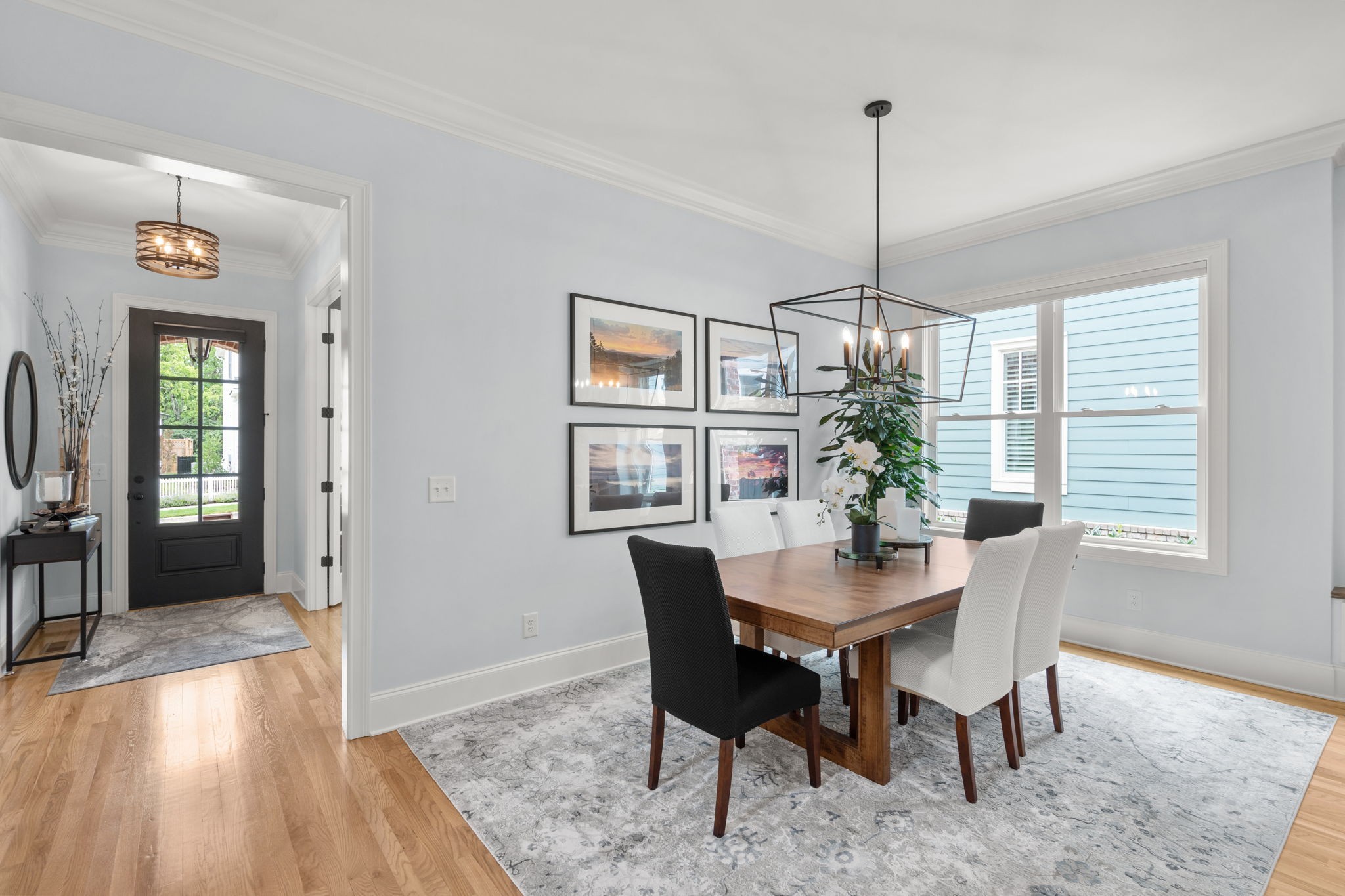 3085 Conar Street Franklin, TN 37064 - Photo 13 of 55 a dining room with furniture a chandelier and wooden floor