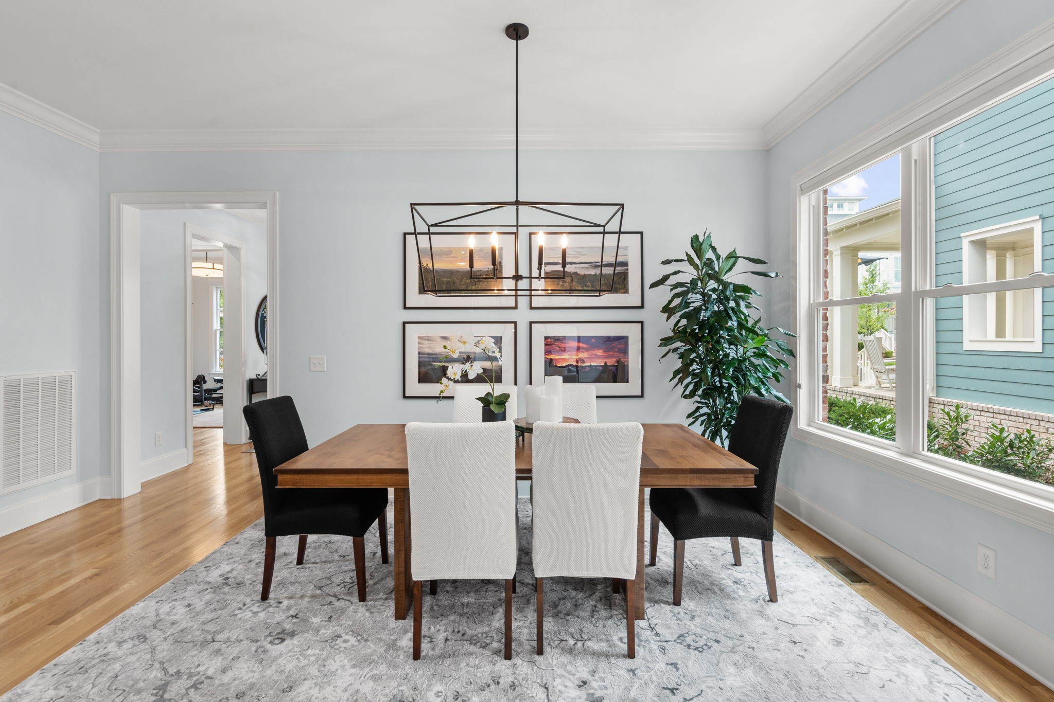 3085 Conar Street Franklin, TN 37064 - Photo 14 of 55 a dining room with furniture a chandelier and wooden floor