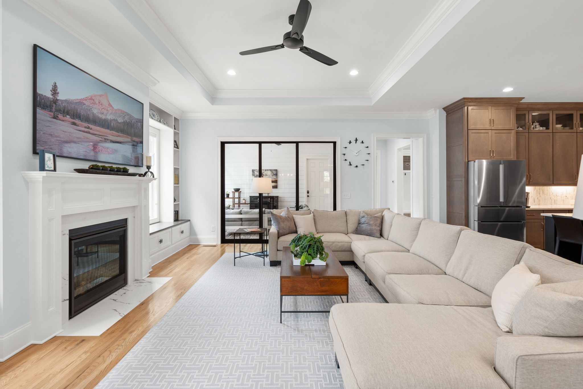 3085 Conar Street Franklin, TN 37064 - Photo 15 of 55 a living room with furniture a fireplace and a flat screen tv