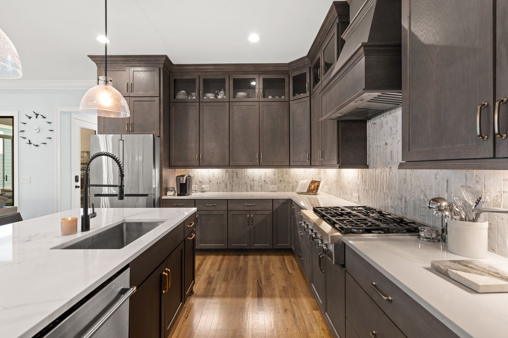 3085 Conar Street Franklin, TN 37064 - Photo 20 of 55 a kitchen that has a sink and a stove in it