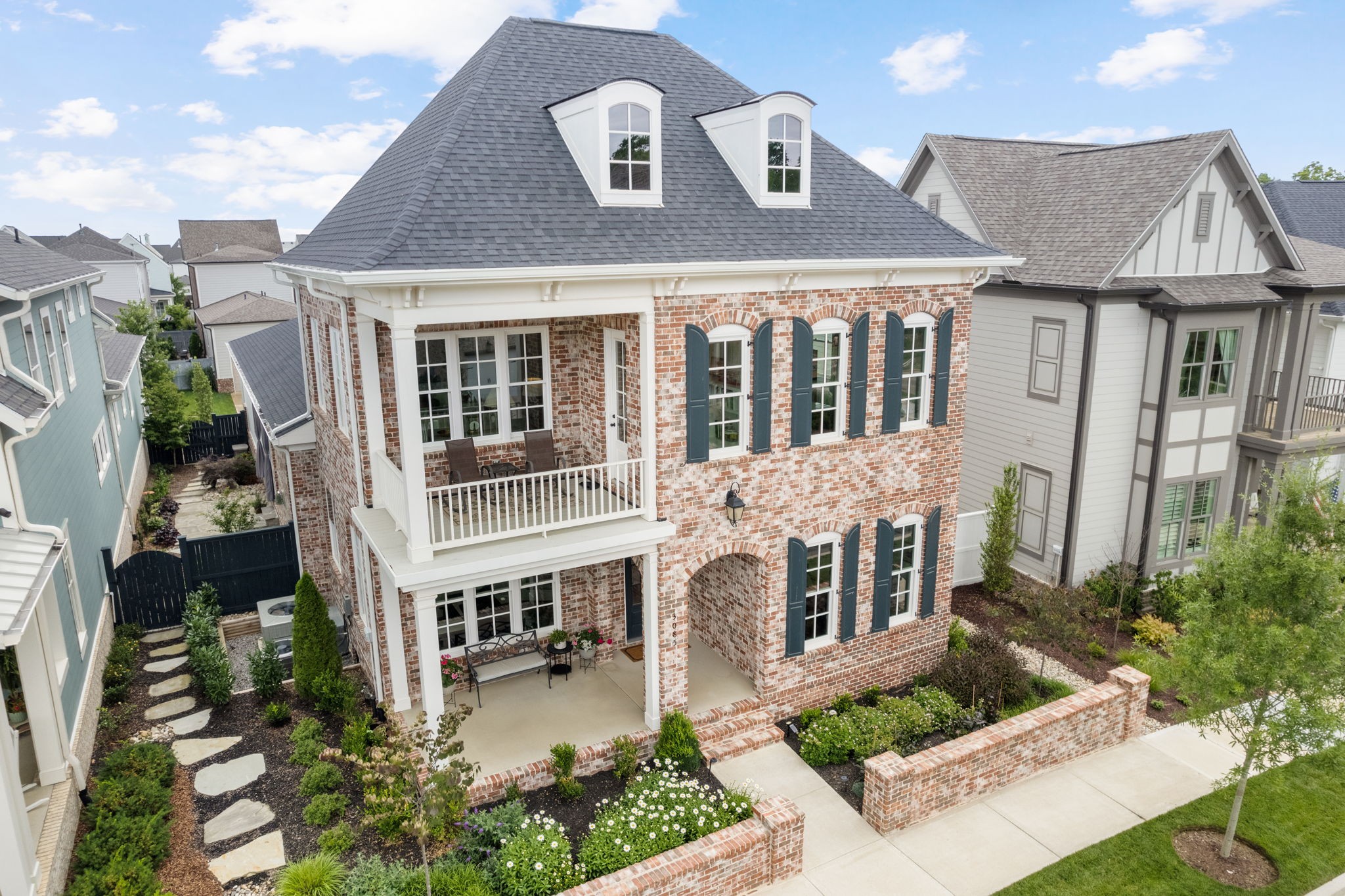 3085 Conar Street Franklin, TN 37064 - Photo 2 of 55 a front view of a house with a garden and plants