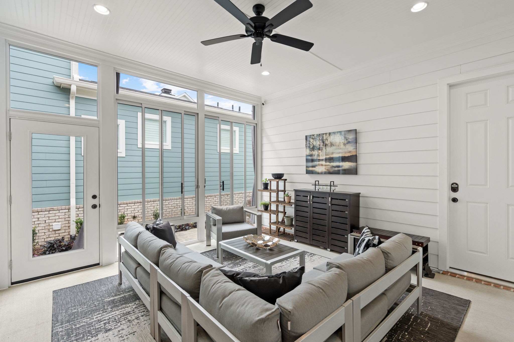 3085 Conar Street Franklin, TN 37064 - Photo 32 of 55 a living room with furniture and a floor to ceiling window