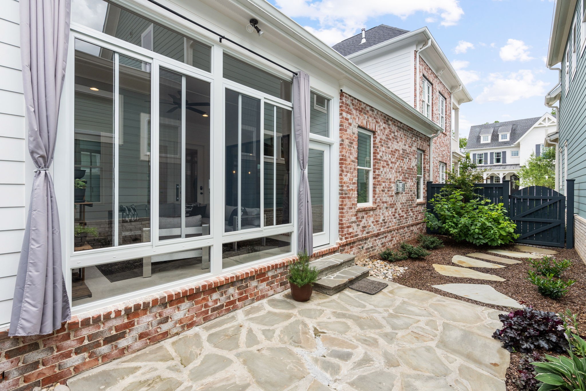 3085 Conar Street Franklin, TN 37064 - Photo 34 of 55 a view of a house with a large window and plants