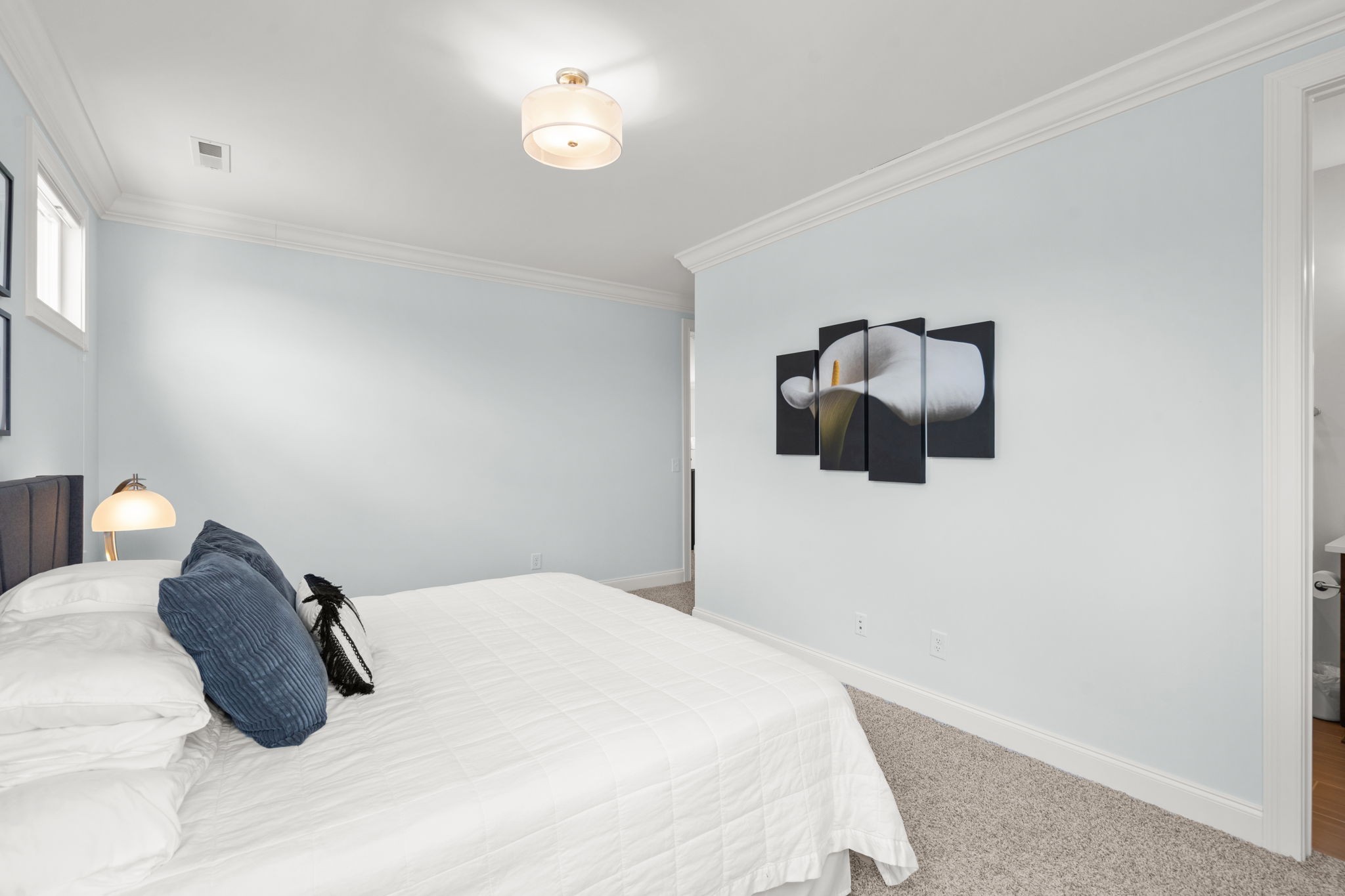 3085 Conar Street Franklin, TN 37064 - Photo 40 of 55 a bedroom with a bed and a painting on the wall