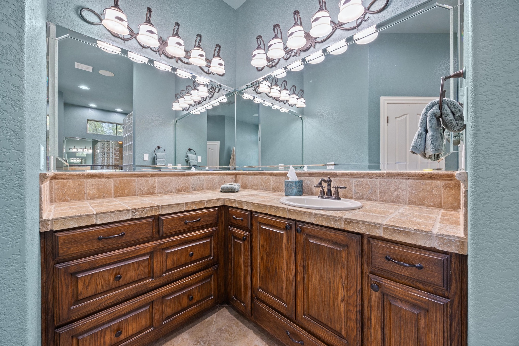 112 Shady Elm Georgetown, TX 78633 - Photo 16 of 31 a view of a sink and a mirror in a room